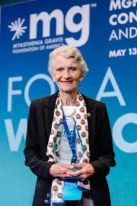 Angela Vincent holds award