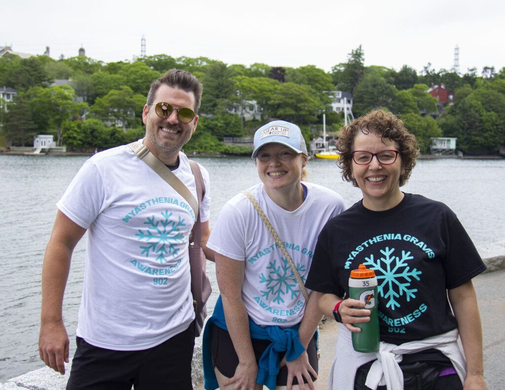 People in myasthenia gravis awareness t-shirts